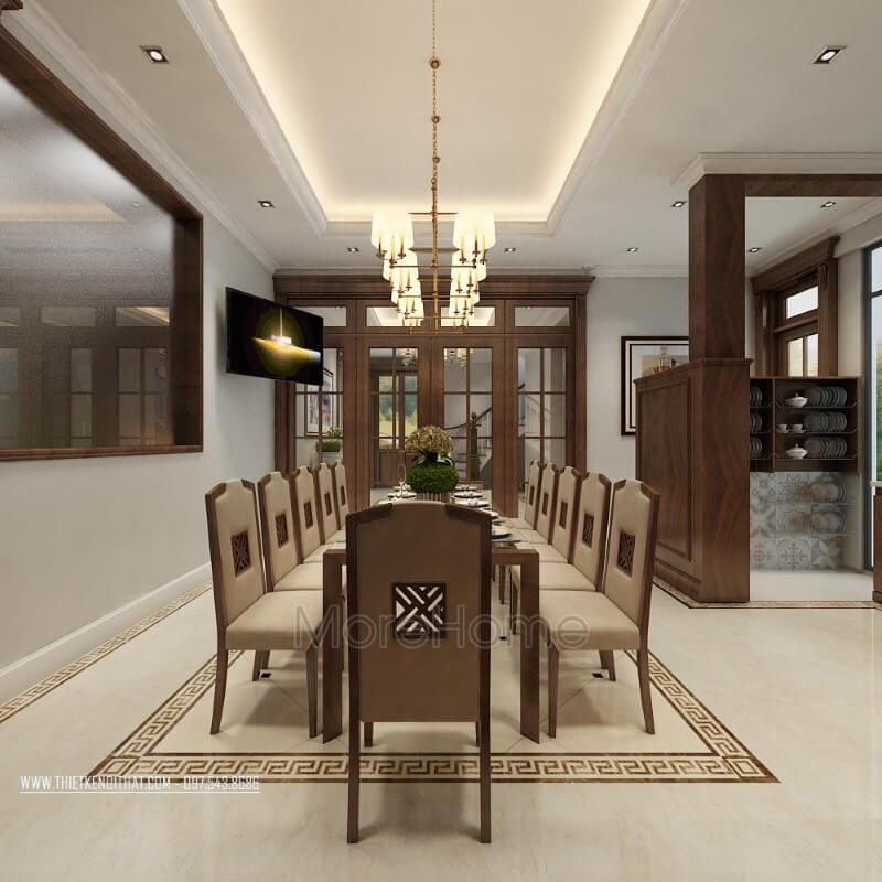 Hình ảnh bàn ghế ăn gỗ óc chó tại phòng ăn biệt thự này được thiết kế vô cùng tinh tế và bắt mắt. Đây là sự lựa chọn tuyệt vời cho những gia chủ nào yêu thích vẻ đẹp vừa hiện đại lại vừa truyền thồng. Thiết kế nội thất phòng ăn gỗ tự nhiên sang trọng