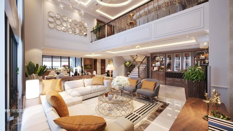 Bộ bàn ghế sofa da cao cấp thiết kế đơn giản với tông trắng kem được lựa chọn với điểm nhấn gối tựa cam đất kết hợp với bàn descor chân inox mạ vàng đẹp sang trọng Ấn tượng với các mẫu thiết kế sofa phòng khách đẳng cấp
