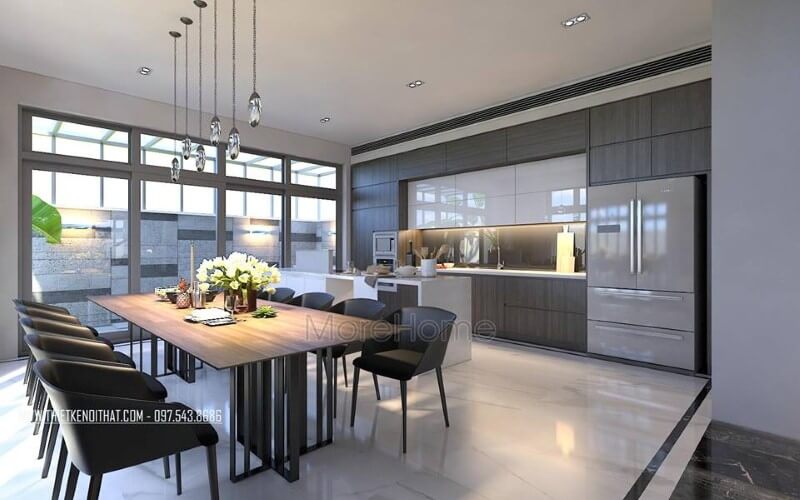 Bàn ghế ăn hiện đại đẹp sang trọng với sự kết nối đồng điệu giữa chiếc bàn gỗ chân sắt sang trọng cùng bộ 8 ghế sẫm màu. Thiết kế phòng ăn đẹp, sang trọng và đẳng cấp